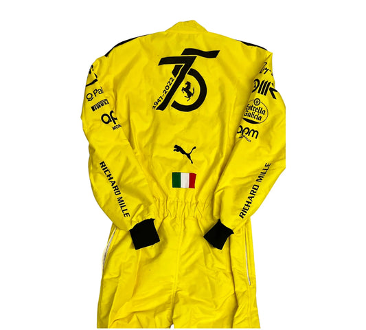 Yellow racing suit with various logos on a white background