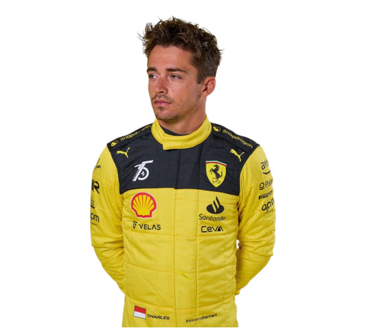Person wearing a yellow racing suit with various sponsor logos on a white background