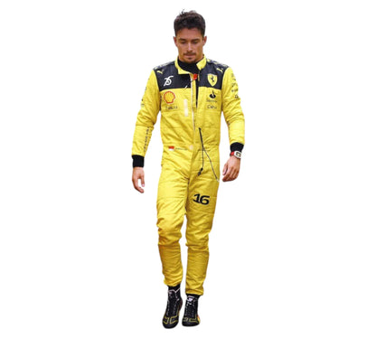 Person wearing a yellow racing suit with sponsor logos on a white background
