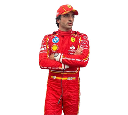 Person wearing a racing suit with various sponsor logos on a white background