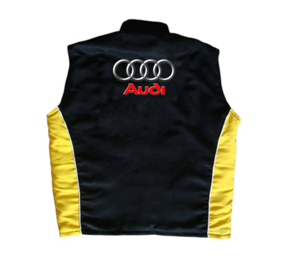 Black vest with yellow sleeves featuring Audi logo on a white background