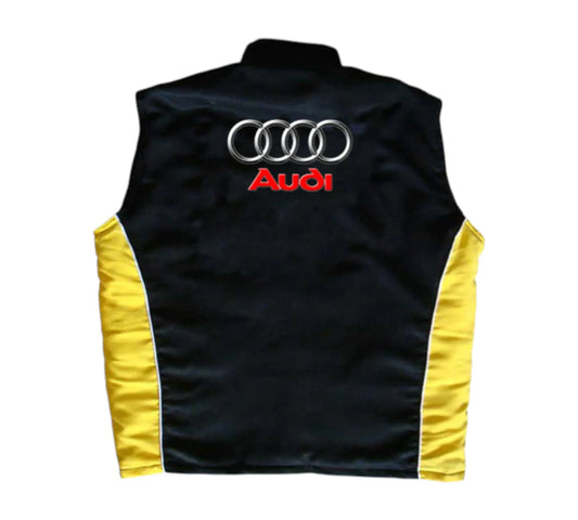 Black vest with yellow sleeves featuring Audi logo on a white background